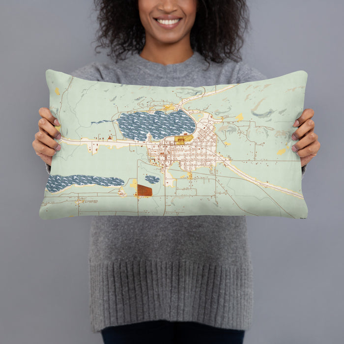 Person holding 20x12 Custom Wakefield Michigan Map Throw Pillow in Woodblock