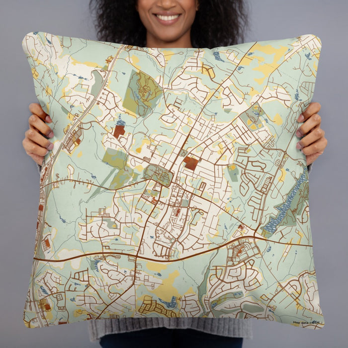 Person holding 22x22 Custom Wake Forest North Carolina Map Throw Pillow in Woodblock