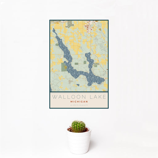 12x18 Walloon Lake Michigan Map Print Portrait Orientation in Woodblock Style With Small Cactus Plant in White Planter