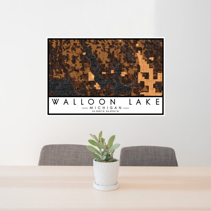 24x36 Walloon Lake Michigan Map Print Lanscape Orientation in Ember Style Behind 2 Chairs Table and Potted Plant