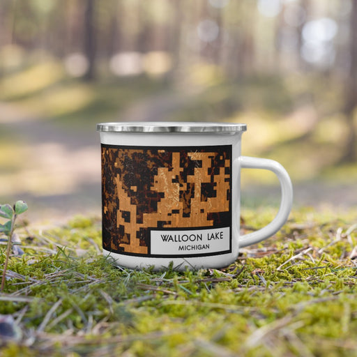 Right View Custom Walloon Lake Michigan Map Enamel Mug in Ember on Grass With Trees in Background