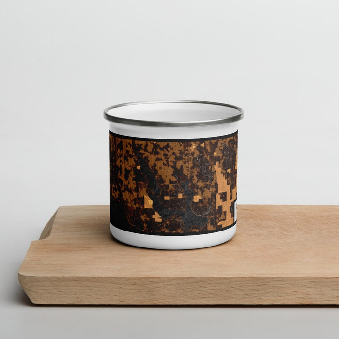 Front View Custom Walloon Lake Michigan Map Enamel Mug in Ember on Cutting Board