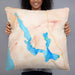 Person holding 22x22 Custom Walloon Lake Michigan Map Throw Pillow in Watercolor