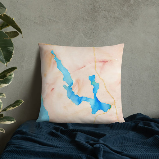 Custom Walloon Lake Michigan Map Throw Pillow in Watercolor on Bedding Against Wall