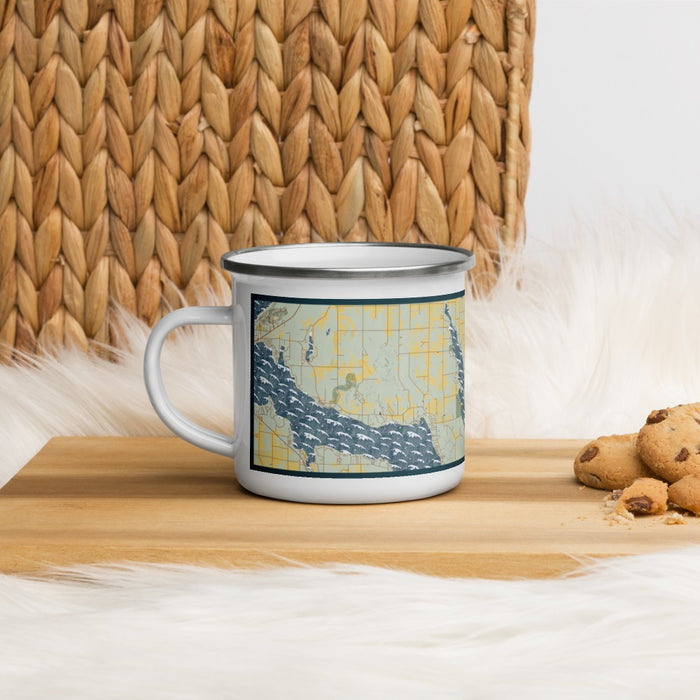 Left View Custom Walloon Lake Michigan Map Enamel Mug in Woodblock on Table Top