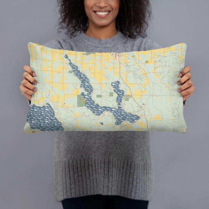 Person holding 20x12 Custom Walloon Lake Michigan Map Throw Pillow in Woodblock
