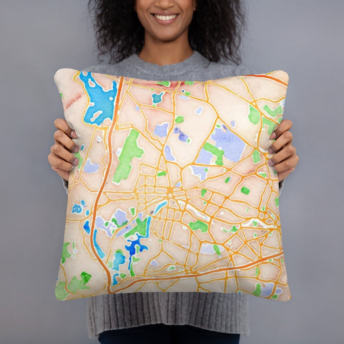 Person holding 18x18 Custom Waltham Massachusetts Map Throw Pillow in Watercolor