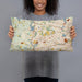 Person holding 20x12 Custom Waltham Massachusetts Map Throw Pillow in Woodblock