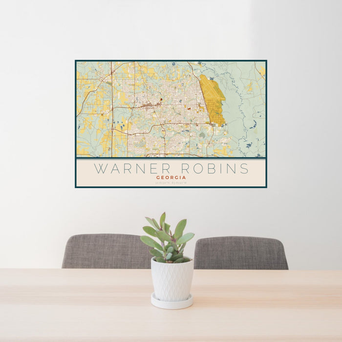 24x36 Warner Robins Georgia Map Print Landscape Orientation in Woodblock Style Behind 2 Chairs Table and Potted Plant
