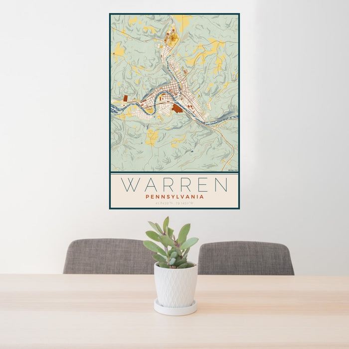 24x36 Warren Pennsylvania Map Print Portrait Orientation in Woodblock Style Behind 2 Chairs Table and Potted Plant