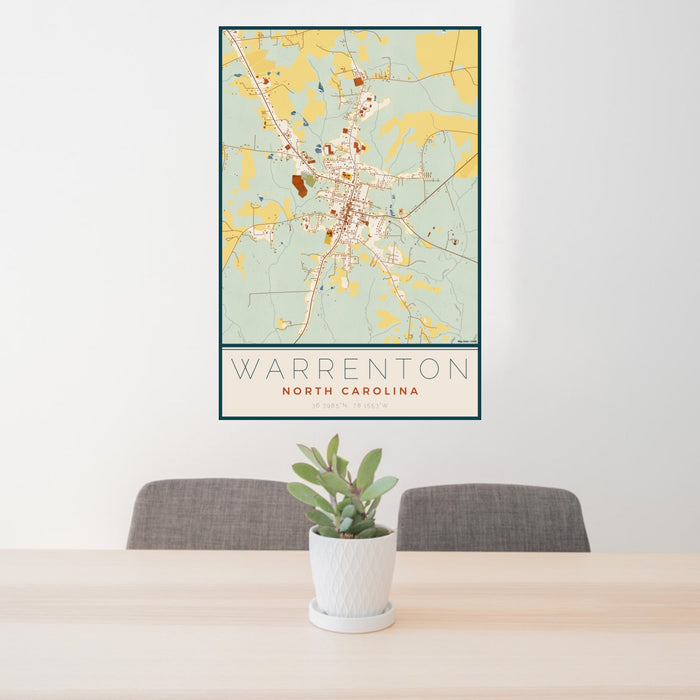 24x36 Warrenton North Carolina Map Print Portrait Orientation in Woodblock Style Behind 2 Chairs Table and Potted Plant