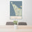 24x36 Warrenton Oregon Map Print Portrait Orientation in Woodblock Style Behind 2 Chairs Table and Potted Plant
