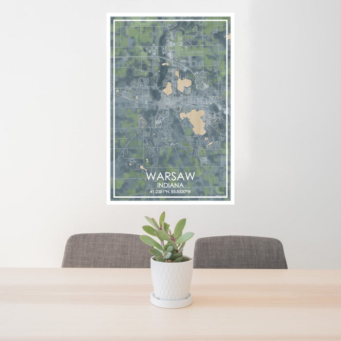 24x36 Warsaw Indiana Map Print Portrait Orientation in Afternoon Style Behind 2 Chairs Table and Potted Plant