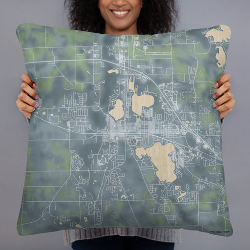 Person holding 22x22 Custom Warsaw Indiana Map Throw Pillow in Afternoon
