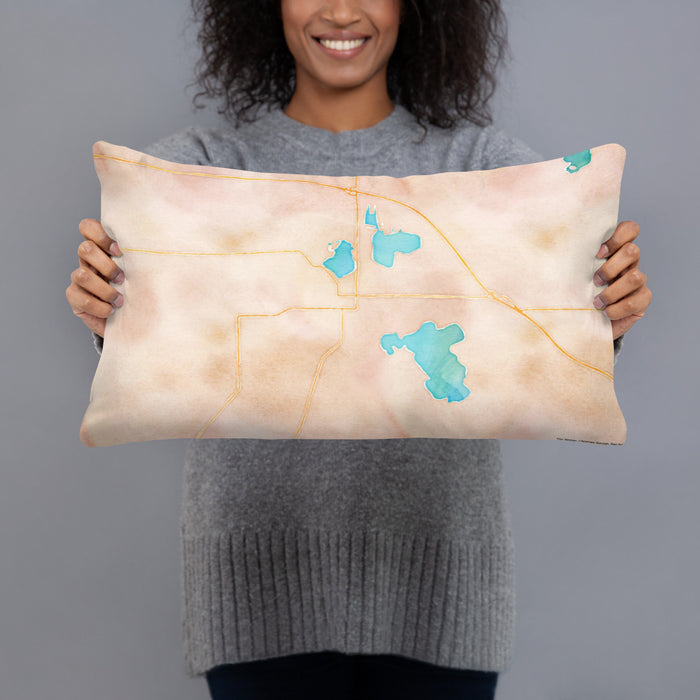 Person holding 20x12 Custom Warsaw Indiana Map Throw Pillow in Watercolor