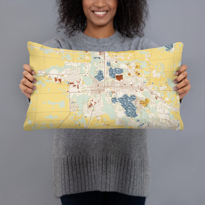 Person holding 20x12 Custom Warsaw Indiana Map Throw Pillow in Woodblock