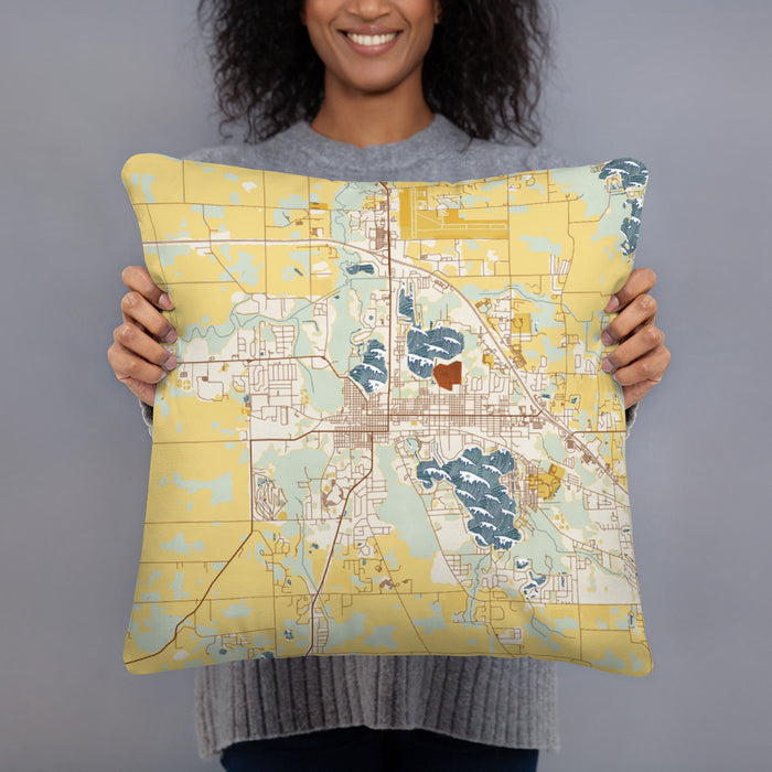 Person holding 18x18 Custom Warsaw Indiana Map Throw Pillow in Woodblock