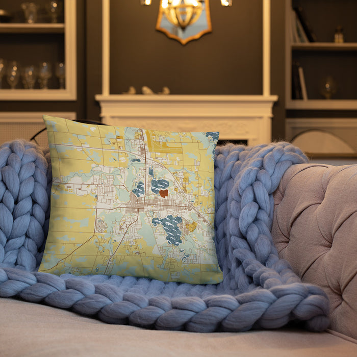 Custom Warsaw Indiana Map Throw Pillow in Woodblock on Cream Colored Couch