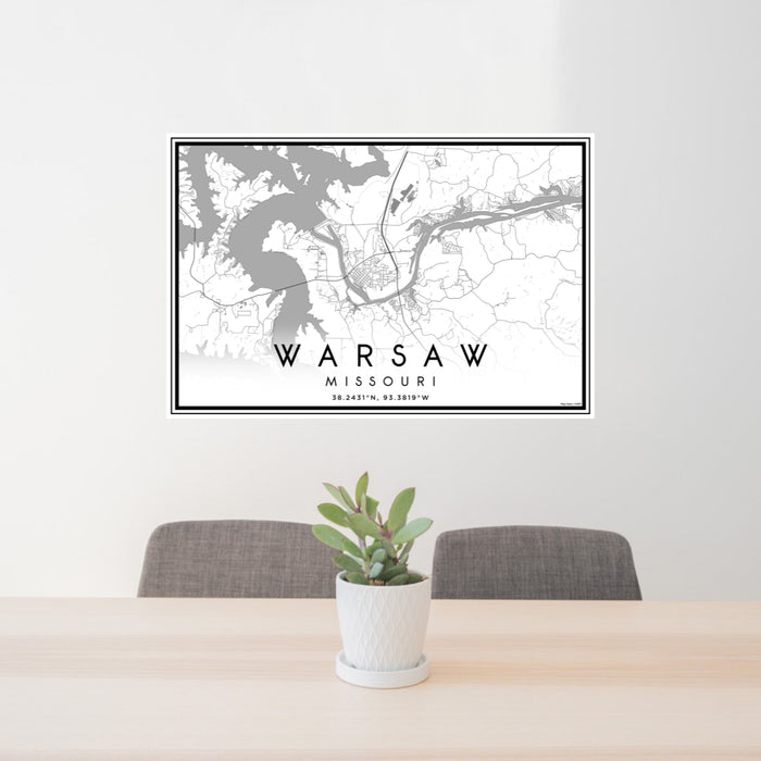 24x36 Warsaw Missouri Map Print Lanscape Orientation in Classic Style Behind 2 Chairs Table and Potted Plant