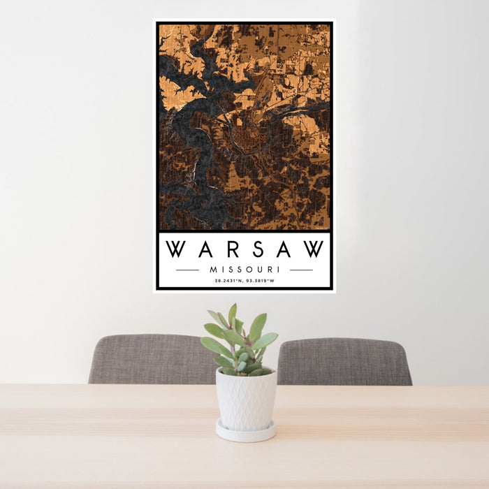 24x36 Warsaw Missouri Map Print Portrait Orientation in Ember Style Behind 2 Chairs Table and Potted Plant