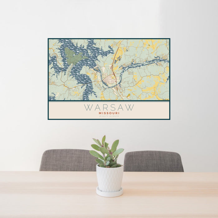 24x36 Warsaw Missouri Map Print Lanscape Orientation in Woodblock Style Behind 2 Chairs Table and Potted Plant