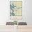24x36 Warsaw Missouri Map Print Portrait Orientation in Woodblock Style Behind 2 Chairs Table and Potted Plant