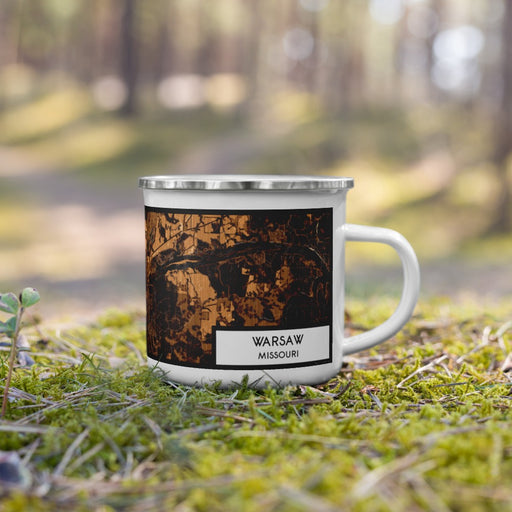 Right View Custom Warsaw Missouri Map Enamel Mug in Ember on Grass With Trees in Background