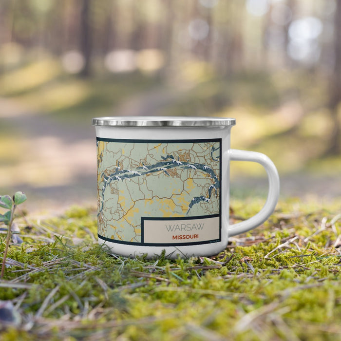 Right View Custom Warsaw Missouri Map Enamel Mug in Woodblock on Grass With Trees in Background