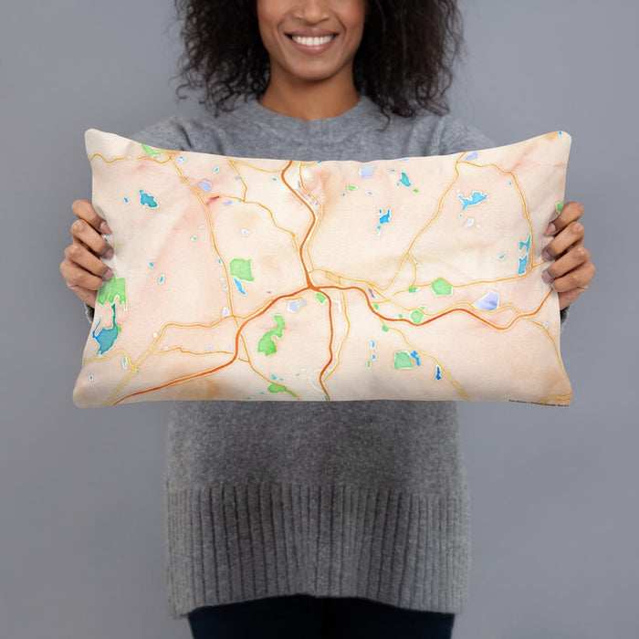 Person holding 20x12 Custom Waterbury Connecticut Map Throw Pillow in Watercolor