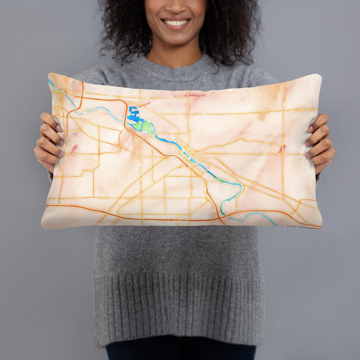 Person holding 20x12 Custom Waterloo Iowa Map Throw Pillow in Watercolor