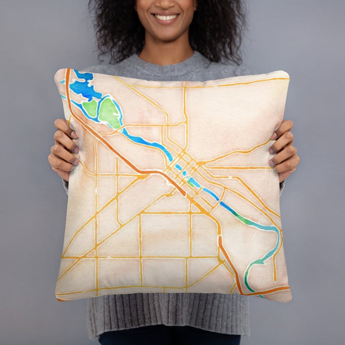 Person holding 18x18 Custom Waterloo Iowa Map Throw Pillow in Watercolor