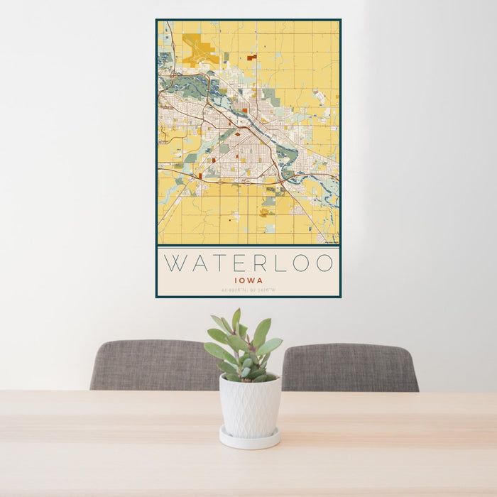 24x36 Waterloo Iowa Map Print Portrait Orientation in Woodblock Style Behind 2 Chairs Table and Potted Plant