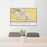 24x36 Waterloo Iowa Map Print Landscape Orientation in Woodblock Style Behind 2 Chairs Table and Potted Plant