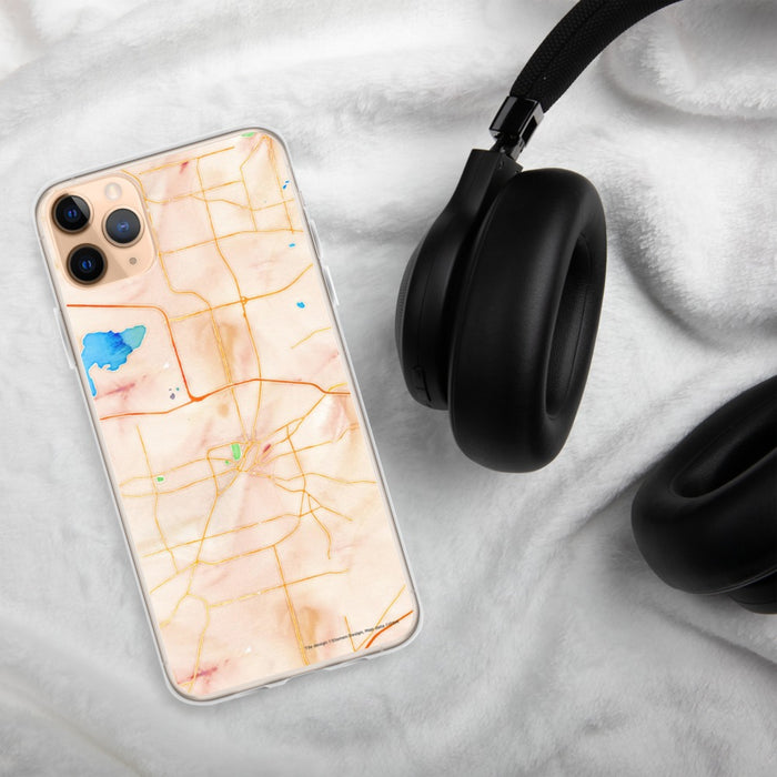 Custom Waukesha Wisconsin Map Phone Case in Watercolor on Table with Black Headphones