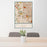 24x36 Wauwatosa Wisconsin Map Print Portrait Orientation in Woodblock Style Behind 2 Chairs Table and Potted Plant