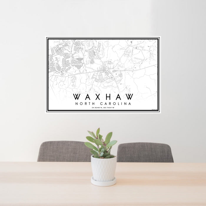 24x36 Waxhaw North Carolina Map Print Lanscape Orientation in Classic Style Behind 2 Chairs Table and Potted Plant