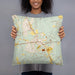 Person holding 18x18 Custom Waxhaw North Carolina Map Throw Pillow in Woodblock