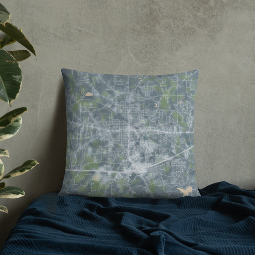 Custom Weatherford Texas Map Throw Pillow in Afternoon on Bedding Against Wall
