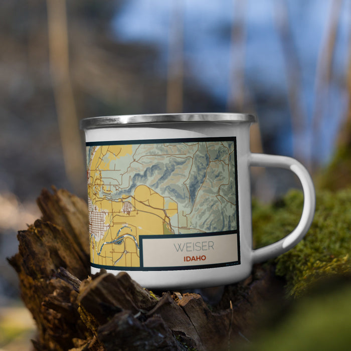 Right View Custom Weiser Idaho Map Enamel Mug in Woodblock on Grass With Trees in Background