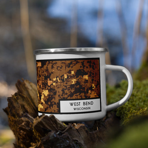 Right View Custom West Bend Wisconsin Map Enamel Mug in Ember on Grass With Trees in Background