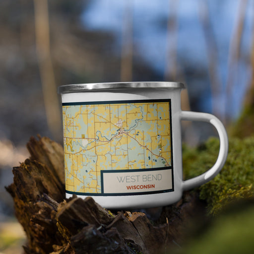 Right View Custom West Bend Wisconsin Map Enamel Mug in Woodblock on Grass With Trees in Background