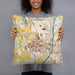 Person holding 18x18 Custom West Lafayette Indiana Map Throw Pillow in Woodblock
