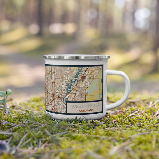 Right View Custom Westminster Colorado Map Enamel Mug in Woodblock on Grass With Trees in Background