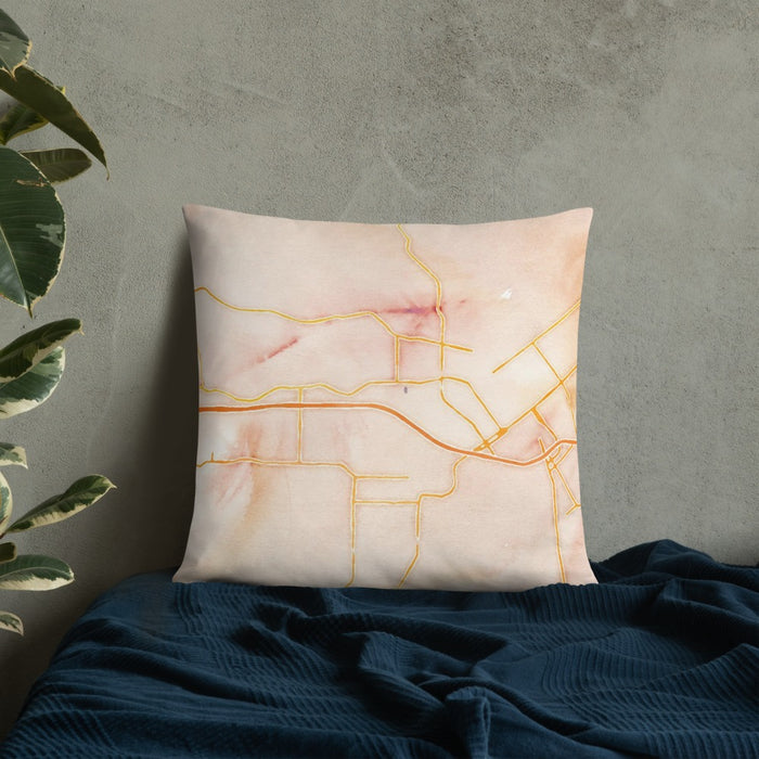 Custom West Monroe Louisiana Map Throw Pillow in Watercolor on Bedding Against Wall