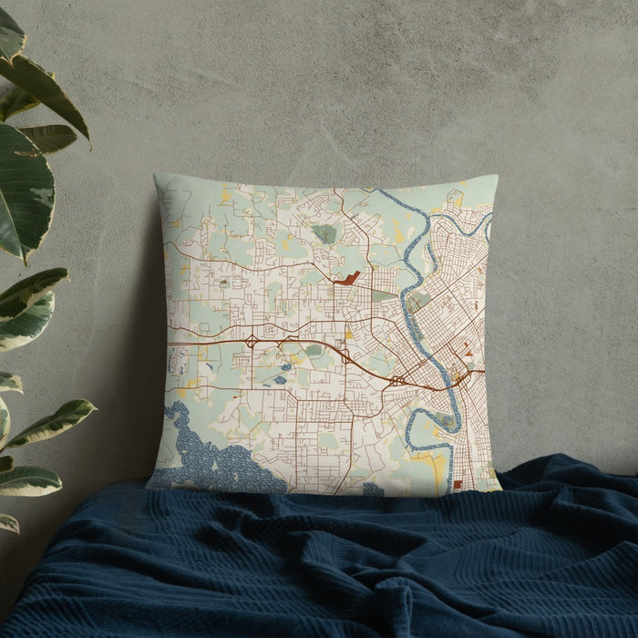 Custom West Monroe Louisiana Map Throw Pillow in Woodblock on Bedding Against Wall