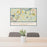 24x36 West Newbury Massachusetts Map Print Lanscape Orientation in Woodblock Style Behind 2 Chairs Table and Potted Plant
