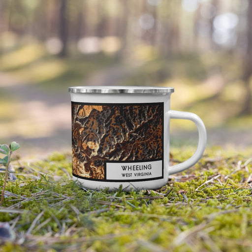 Right View Custom Wheeling West Virginia Map Enamel Mug in Ember on Grass With Trees in Background