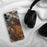 Custom Whitefish Montana Map Phone Case in Ember on Table with Black Headphones