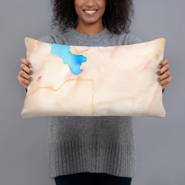 Person holding 20x12 Custom Whitefish Montana Map Throw Pillow in Watercolor