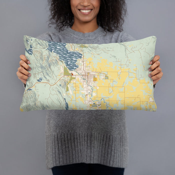Person holding 20x12 Custom Whitefish Montana Map Throw Pillow in Woodblock